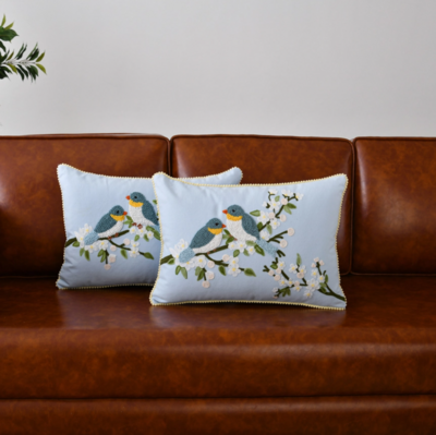 Light blue cushion with hand-embroidered birds - 14x20